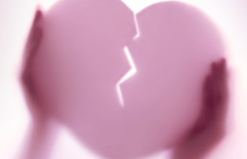 Someone holding a broken heart