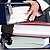 Someone being handed binders