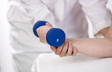 Arm lifting five pound weight Arm lifting five pound weight