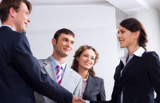 Business man and woman shaking hands Business man and woman shaking hands