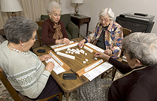 Elderly women playing scrabble