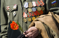 War veteran holding a flower