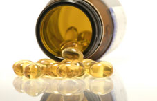 Pills spilling out of bottle Pills spilling out of bottle