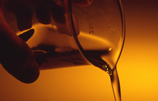 Liquid pouring from a beaker Liquid pouring from a beaker