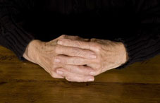 Pair of elderly hands together Pair of elderly hands together