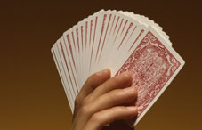 Hand holding deck of cards Hand holding deck of cards