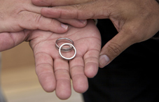 Hand holding wedding rings Hand holding wedding rings