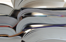 Stacked open books Stacked open books