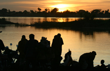 Refugees on a shoreline Refugees on a shoreline