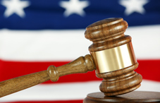 Gavel with American flag in the background