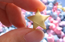 Hand holding picked star Hand holding picked star