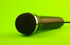 Microphone on green background