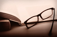 Reading glasses on book