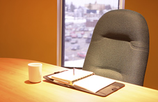 Empty chair at desk