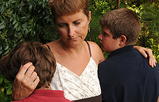Sad mother with sons