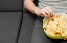 Eating chips on couch Eating chips on couch