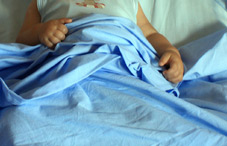 Sick child in hospital bed Sick child in hospital bed