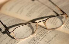 Glasses on textbook