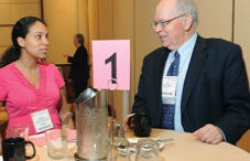 Dr. Pat DeLeon, right, coaches a mentee at this year’s speed mentoring program. (credit: Lloyd Wolf)