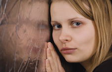 Girl with cracked mirror