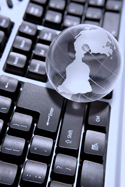 Glass globe on keyboard Glass globe on keyboard