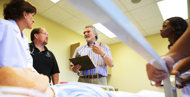 Dr. Salas interacts with nursing students.