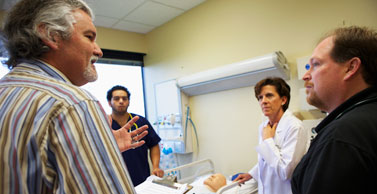 Dr. Salas talks with nursing students