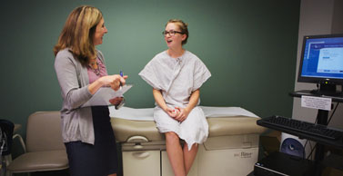 Dr. Tate meets with a study participant.