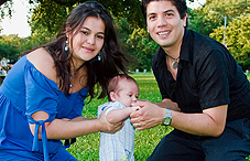 Parents with baby in the park