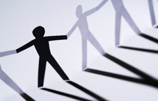 Men icons connected by hands