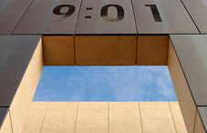 Building structure with "9:01" at the top