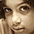 Young girl with curly hair has expressionless face