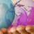 Pair of hands holding three planets