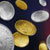 Various coins falling