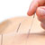 Someone receiving acupuncture 