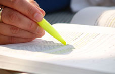 Highlighting writing in a book 