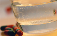 Pills and a cup of water