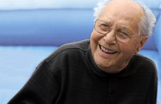An elderly man smiling 