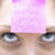 Woman with post-it note on forehead