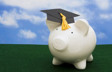 Graduation cap on a piggy bank    