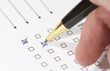 Checking a box with an ink pen