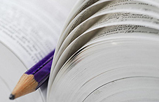 Pencil laying in a open book 