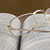 Eye glasses laying on an open book