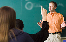 Teacher at front of classroom