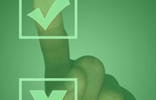 A finger checking a screen 