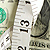 Measuring tape wrapped around dollars