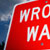 "Wrong Way" street sign