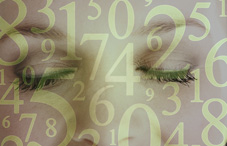 Numbers surronding a woman's face