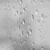 Water drops on a glass in black and white