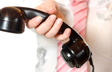Someone holding a telephone